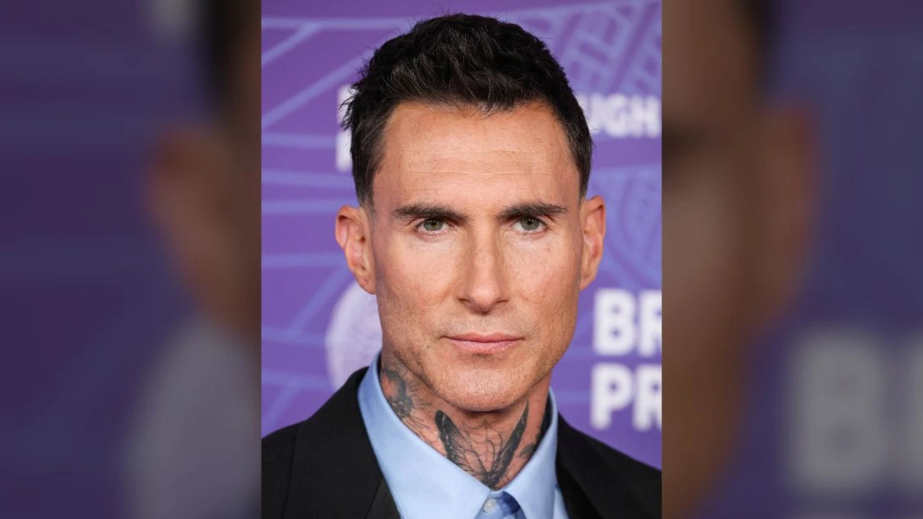 Adam Levine is unrecognizable in rare appearance with wife